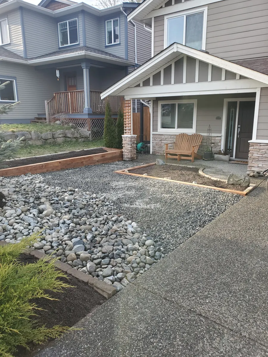 Front yard landscaping and gravel work completed by Mirror Excavating Ltd